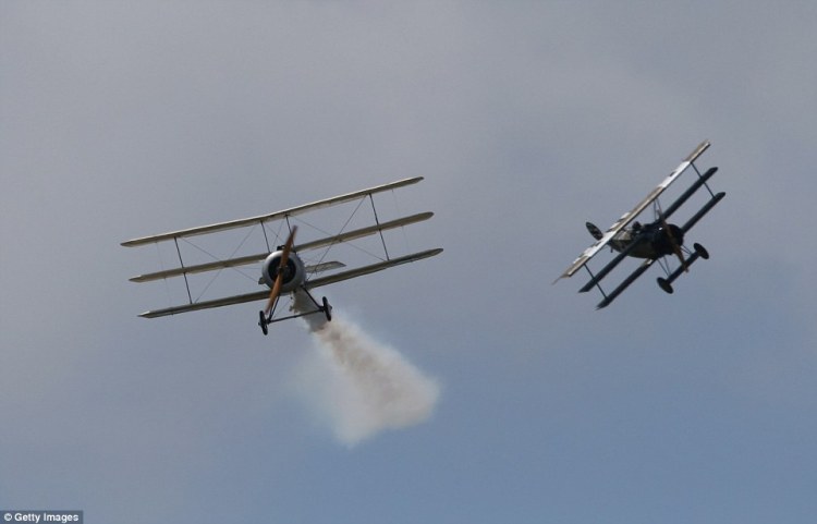 Dogfight between WW1 era British and German tri-planes 