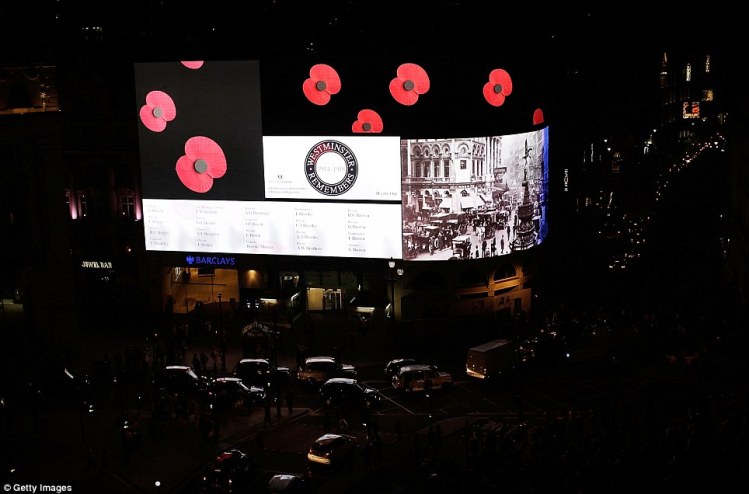 Goodbye Picadilly, farewell Leicester Square... the normally blazingly neon signs at Picadilly are switched off except for remembrance.
