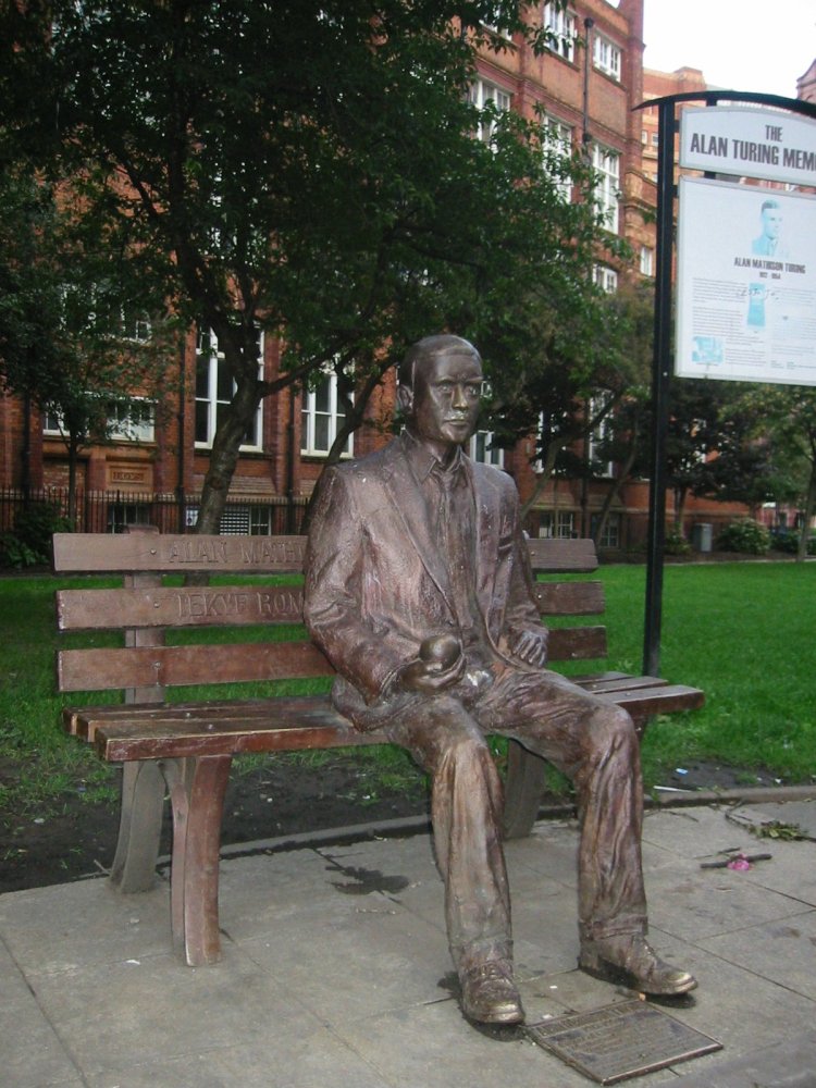 Statue if Alan Turing on a park bench in Manchester.