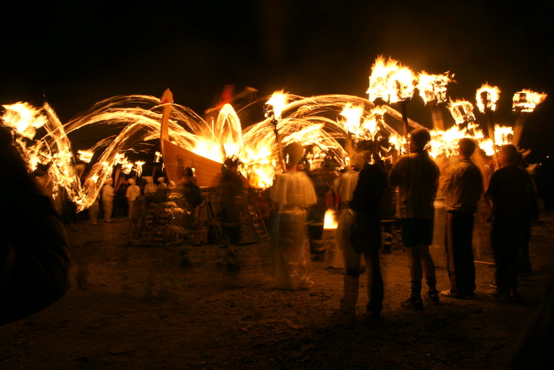 At the end of the night, the beautiful Viking ship which has been carefully built all year, goes up in flames as fiery torches are thrown onto it.