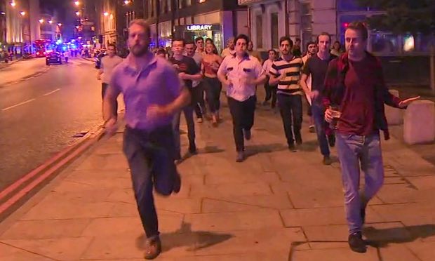 The man on the right is obviously taking everything in his stride.,,, even a terrorist wasn't going to get him to leave his drink. Perhaps as the pubs round London Bridge charge over £5 a pint!