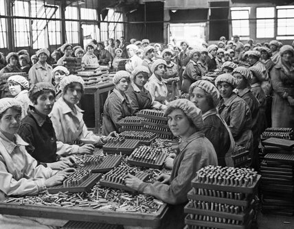 Women working in a small munitions factory at Woolwich Arsenal.