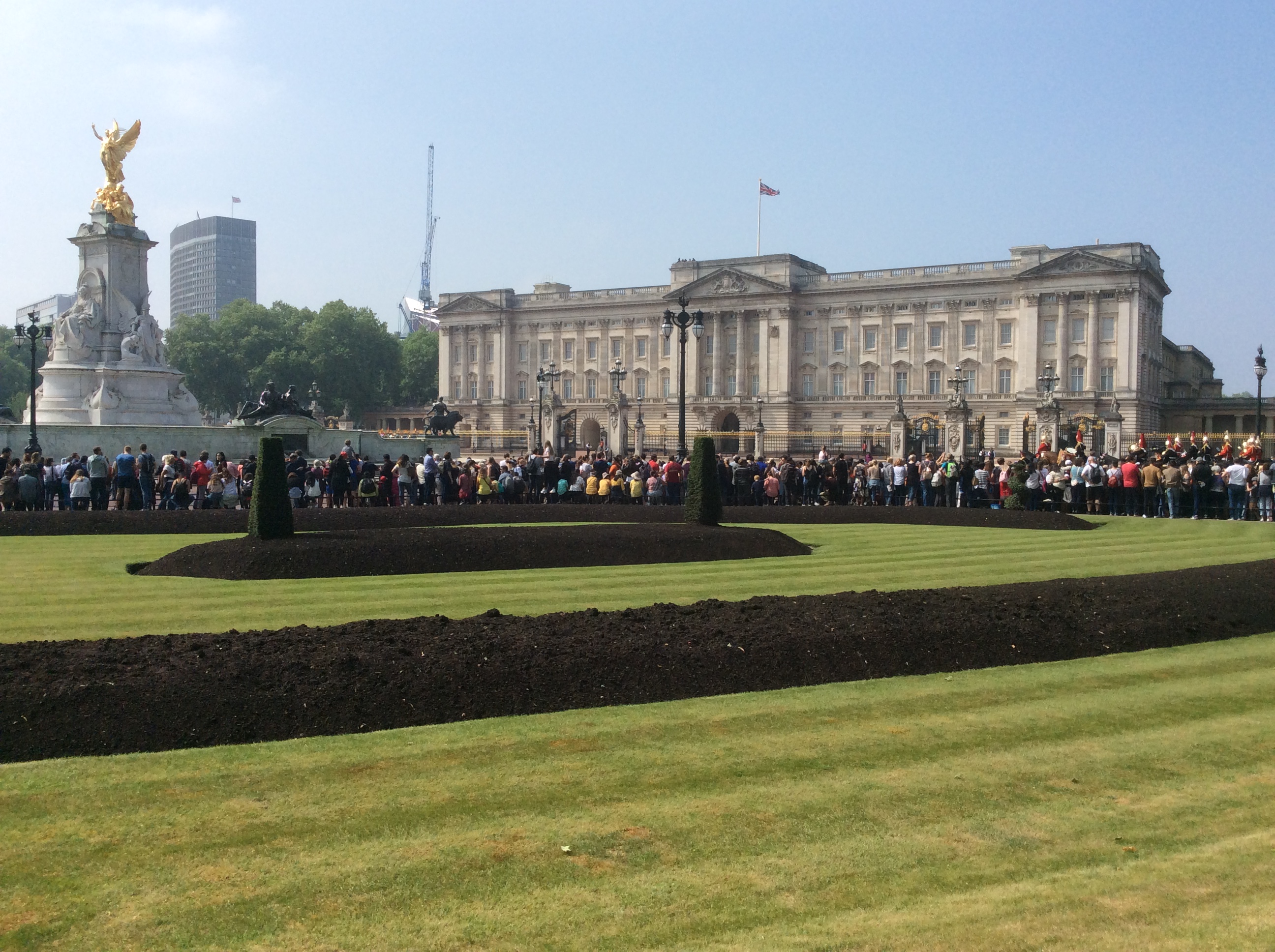 Crowds assemble outside Buckingham Palace