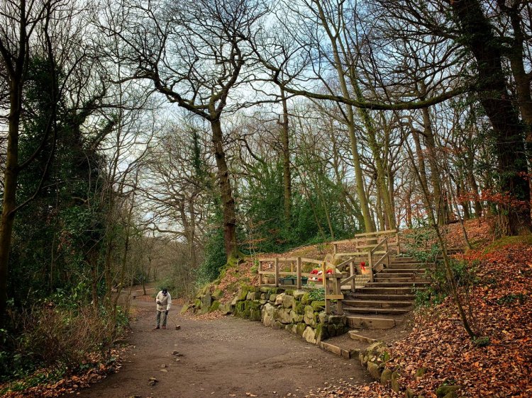 Tony Foulds, sweeping away the leaves at 'his' memorial.