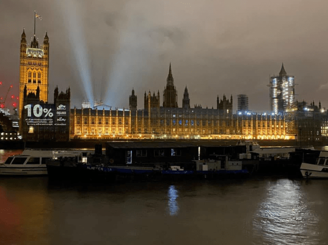 ExcludedUK beamed onto Parliament Photo by Aron Padley