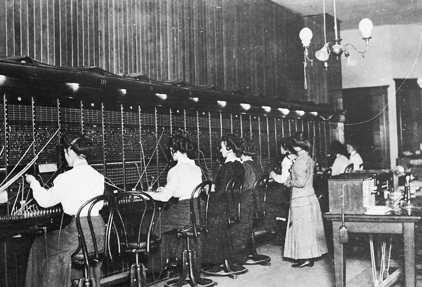 Some early lady telephone switchboard operators.