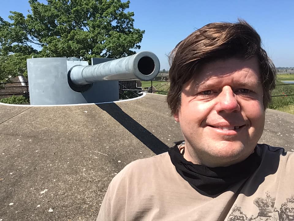 Myself standing in front of one of the more modern artillery pieces looking out at the Thames.